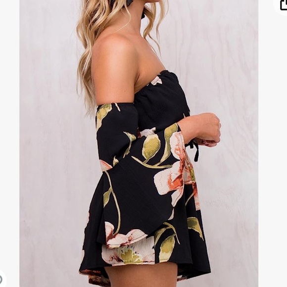 NWOT. Black flowy floral off the shoulder 3/4 sleeve romper. - Picture 2 of 11
